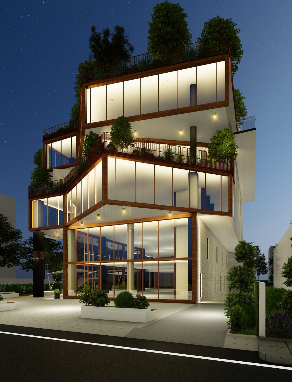 KMU Mixed Commercial — illuminated cantilevered façade at night