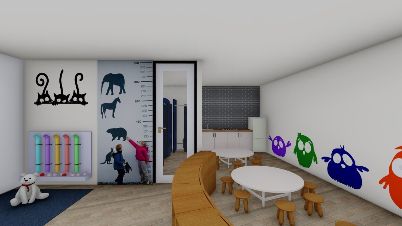 Technopark Crèche — activity tables beside height chart and pantry