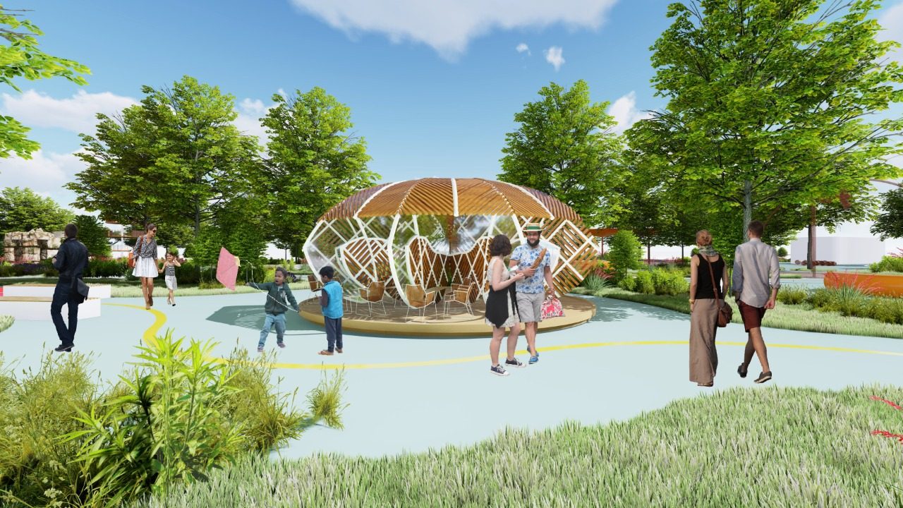 Families and children around the pod in a landscaped park