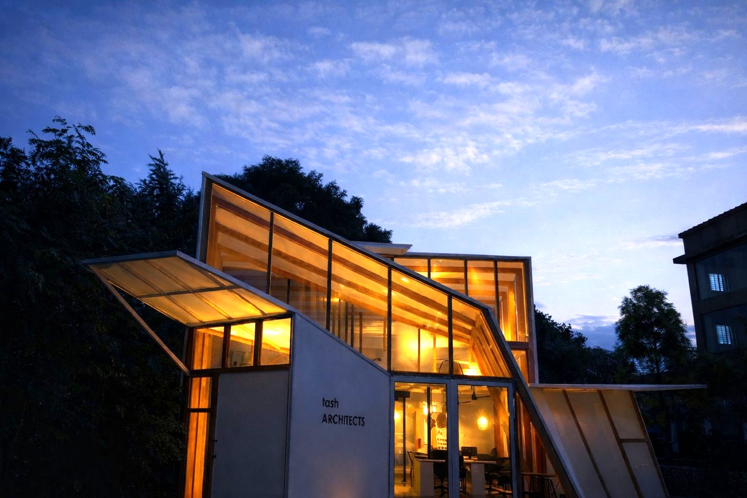 Tash Architects studio at dusk — the practice's Bengaluru headquarters